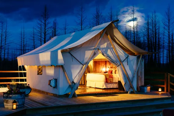 Moonlight over a deluxe tent at Star Camp