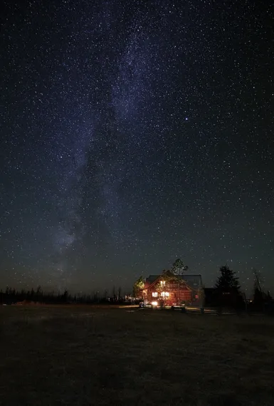 Spectacular star gazing at Siwash Lake with the Milky way over the lodge 