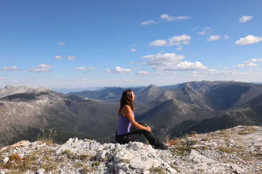 Wellness in the wild while reflecting on a mountain summit at Siwash lake